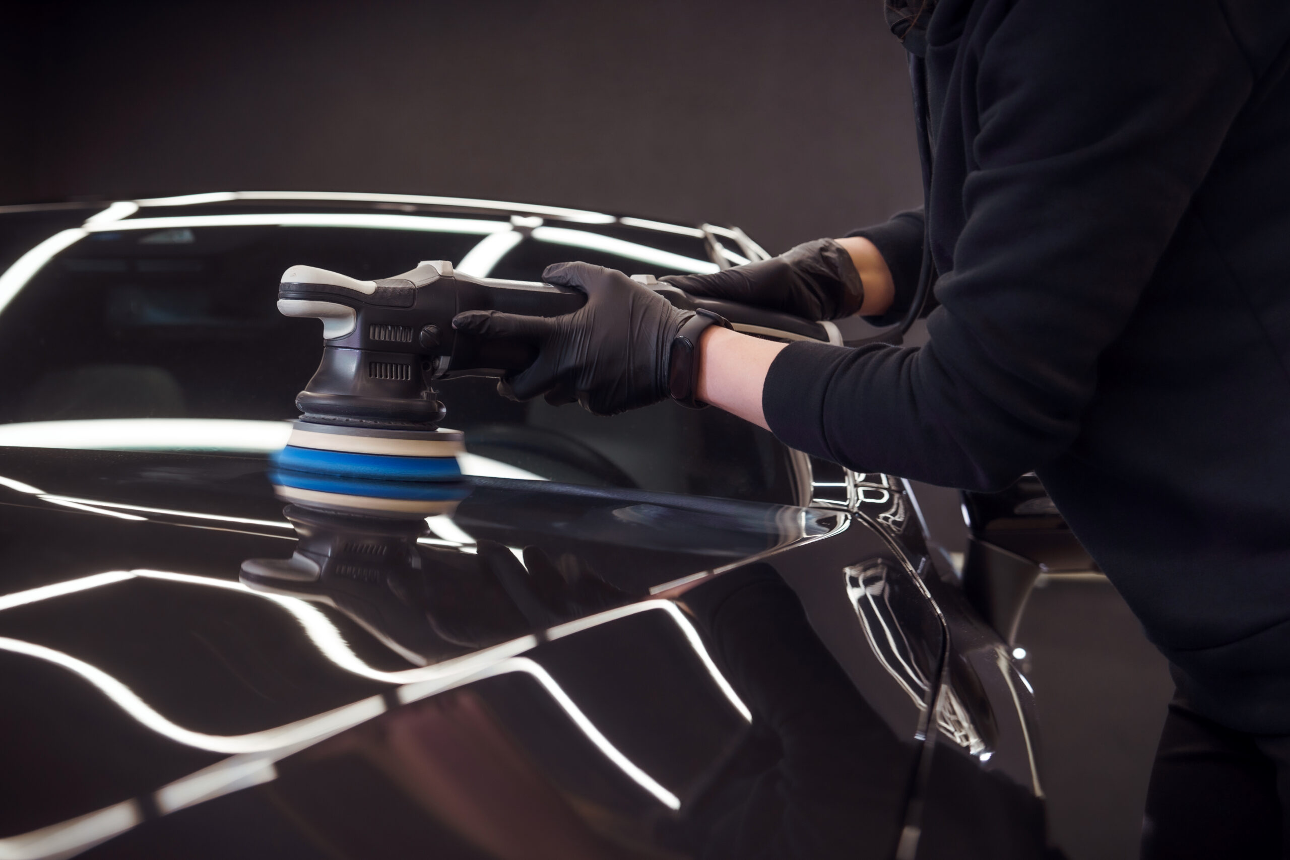 Machine polishing removing oxidation from sun damaged paint